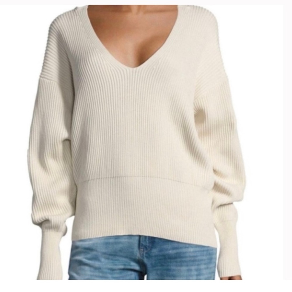 Free People cream knit sweater with deep V